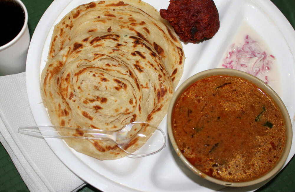 Traditional Kerala Dishesy,Parotta and Curry